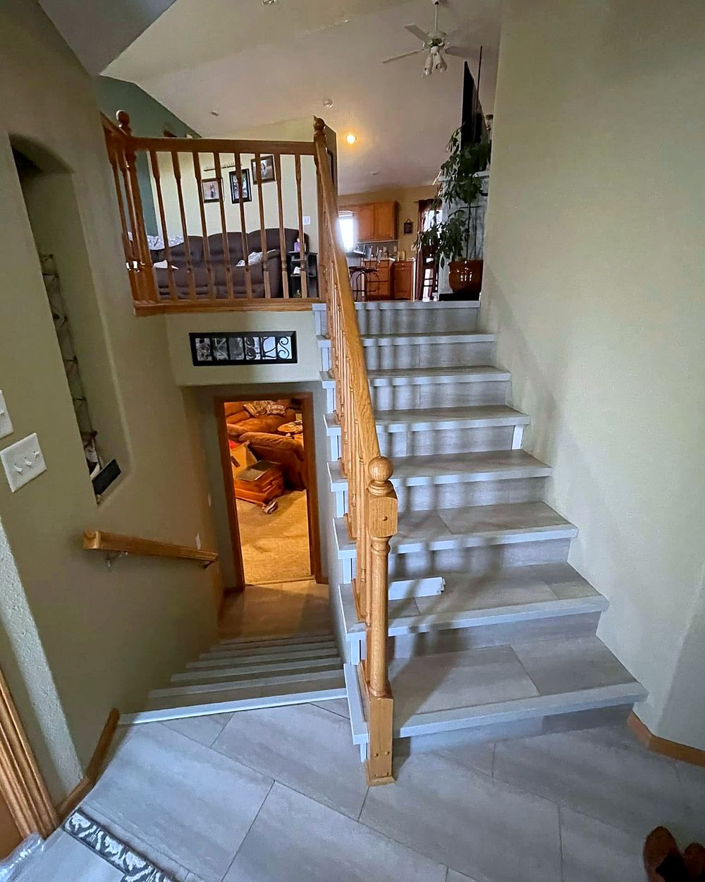 Staircase before — dated oak spindle railing